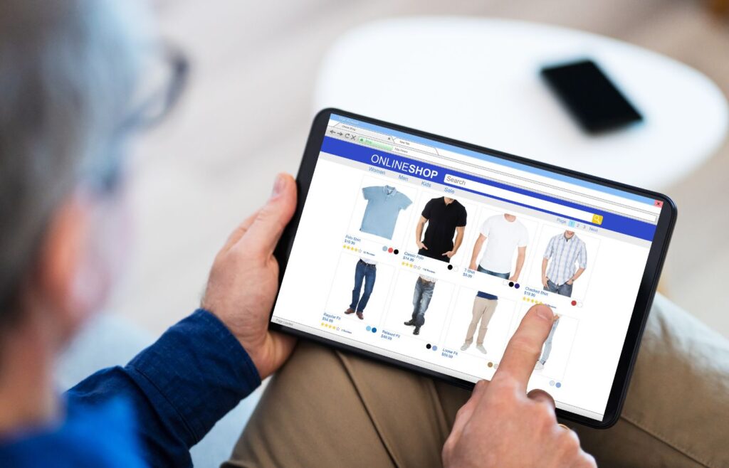 E-commerce SEO checklist - Shows a man browsing an online store on a tablet
