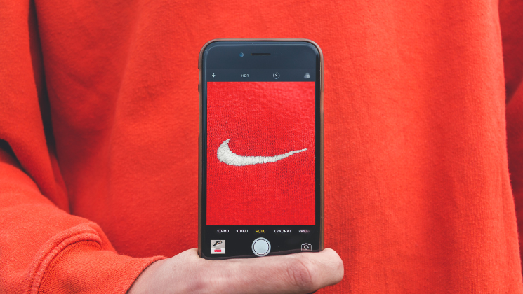 shows an image of a red nike logo on a phone 