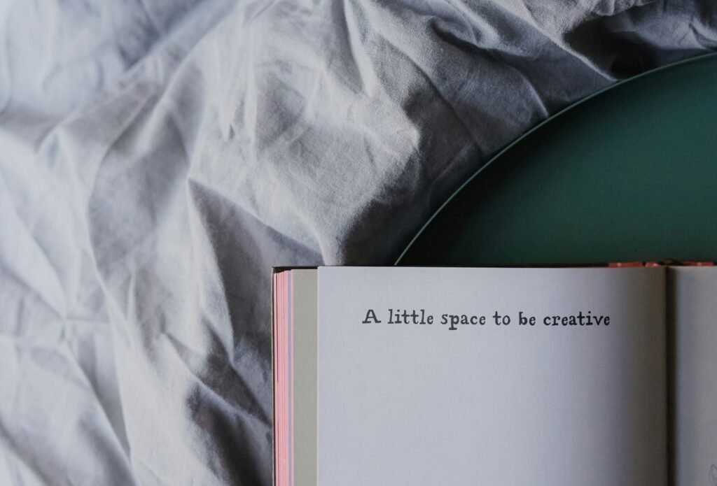 shows a book with the words 'a little space to be creative.' 