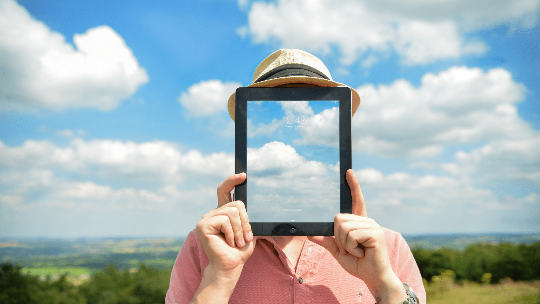 Brand DNA - Shows a person holding up a tablet