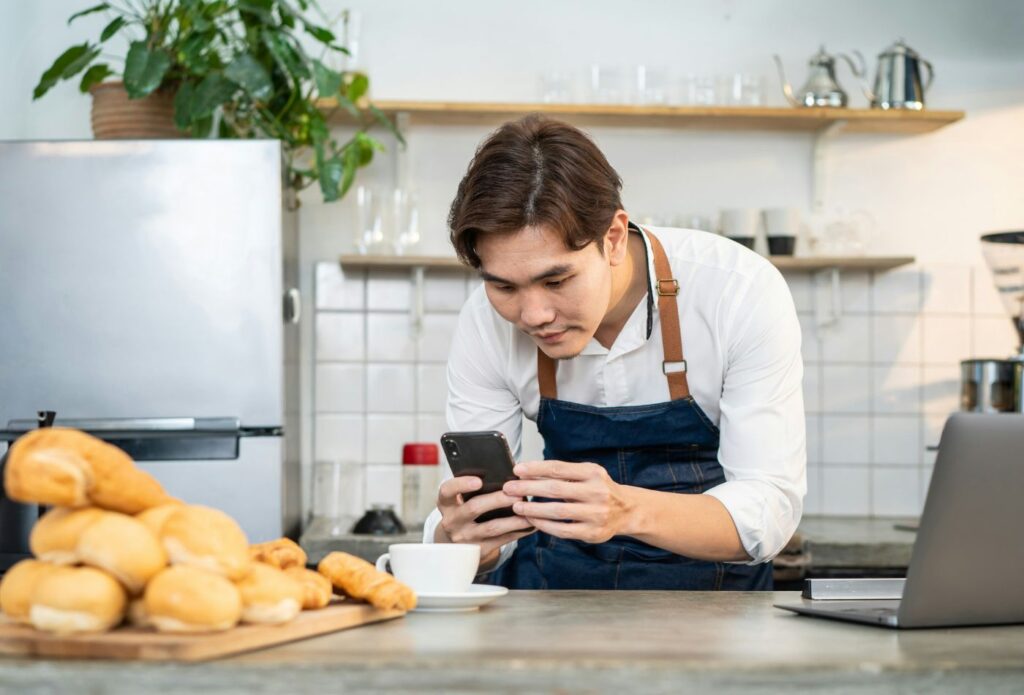 Food copywriting guide - Shows a chef taking a photo of a cup of coffee