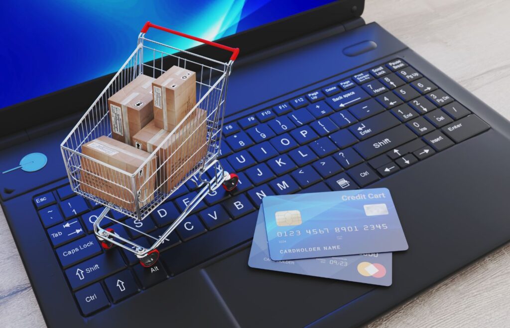 Shows an E-commerce SEO graphic - laptop with shopping trolley