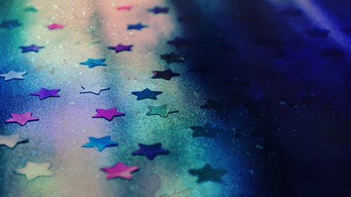 Shows a collection of coloured stars