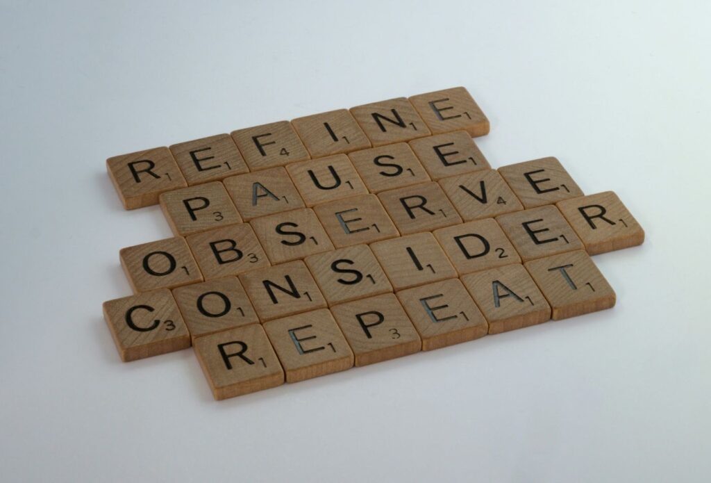 shows words spelt out from scrabble blocks - How to Create Brand Tone of Voice Guidelines