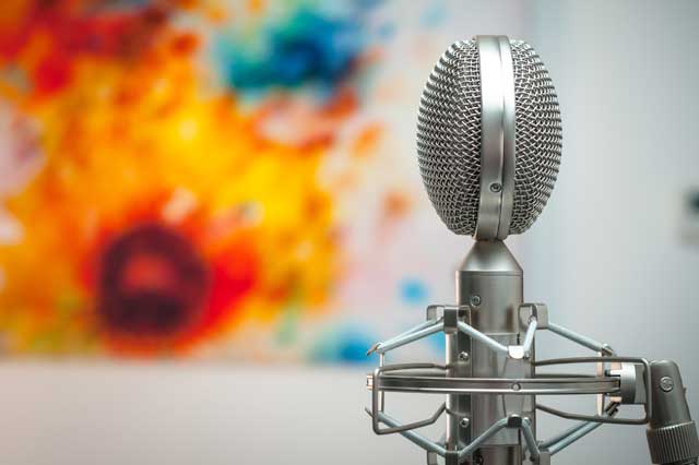 How to create brand tone of voice guidelines - Microphone image