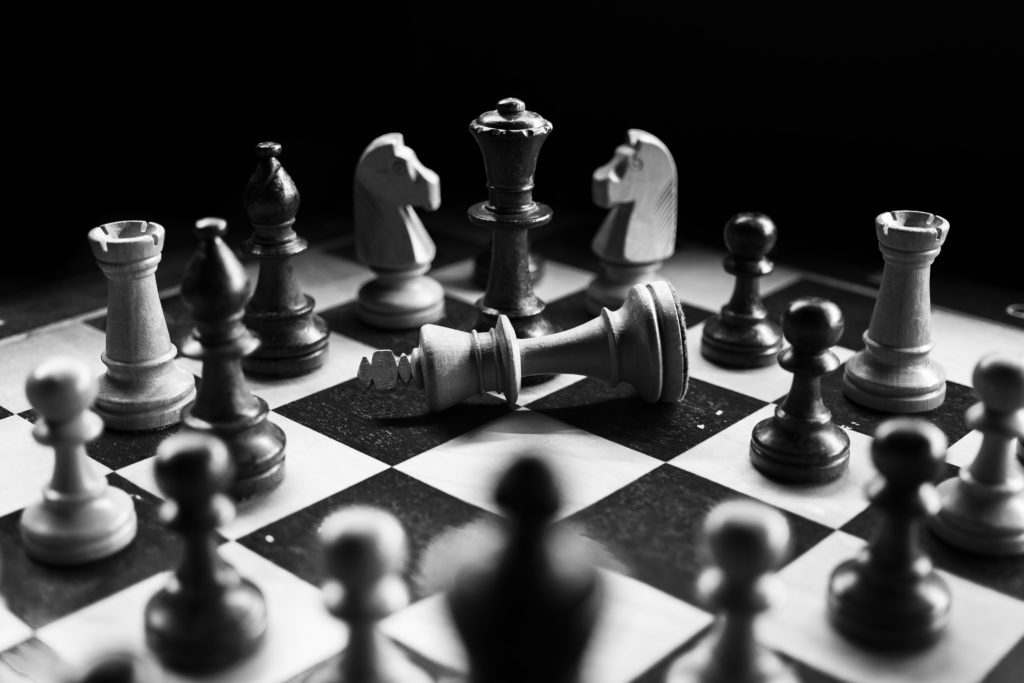 How to improve your website copy - Fallen king on a chess board