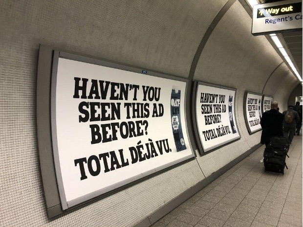 Shows an advertising banner in a tube station