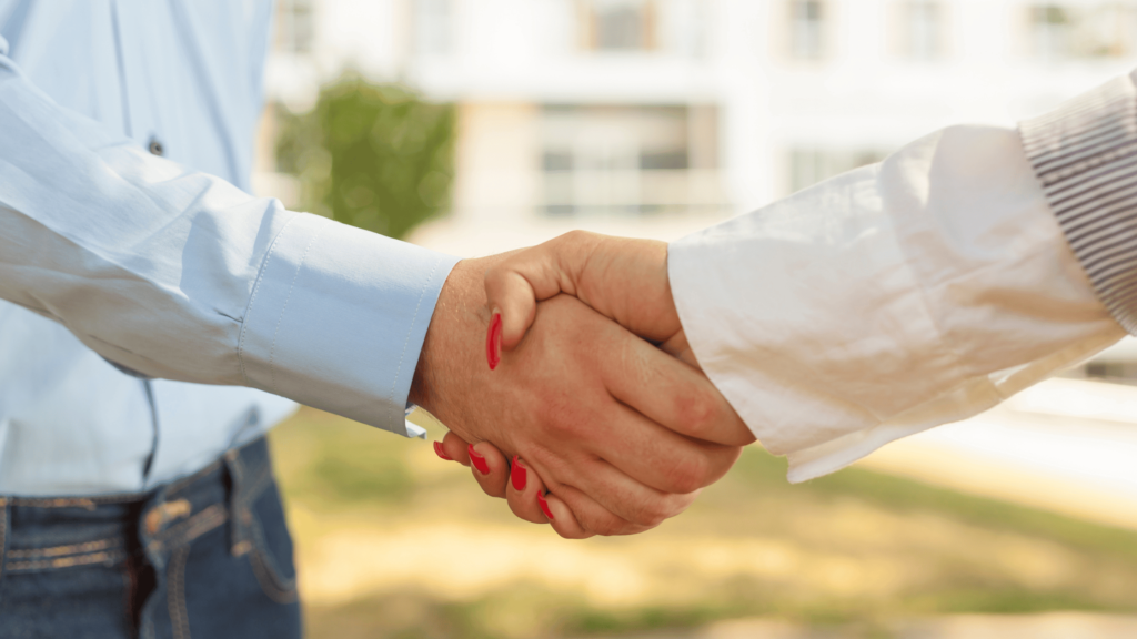 How to write a case study - Shows two people shaking hands