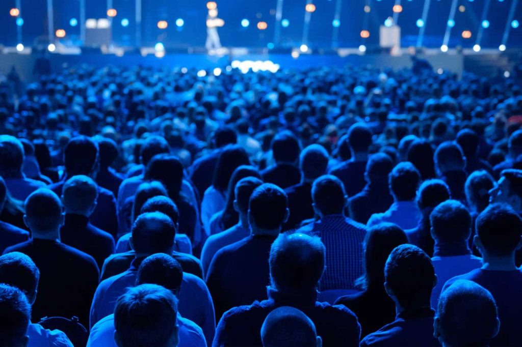 Essential copywriting skills - Shows a crowd at a seminar