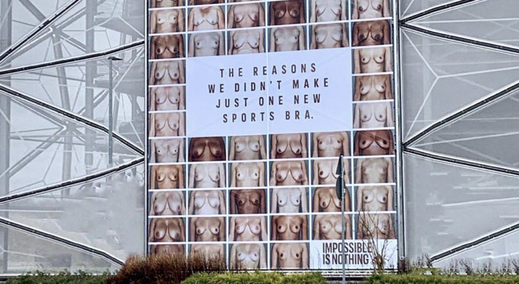 Shows an adidas billboard with an impactful message