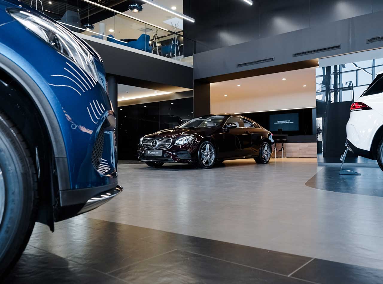 Automotive copywriting service - Shows the interior of a car showroom