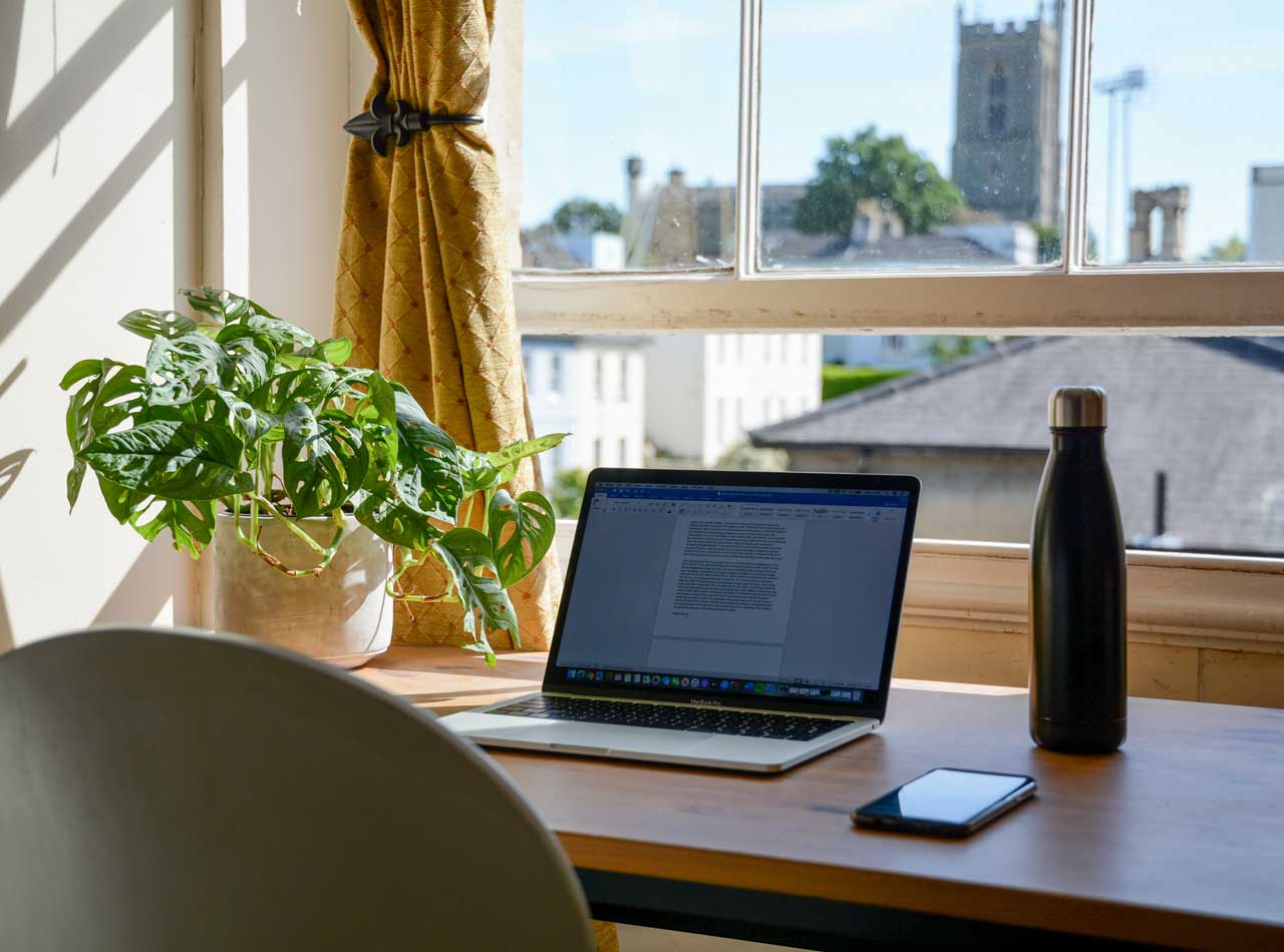 Shows a workstation overlooking the city