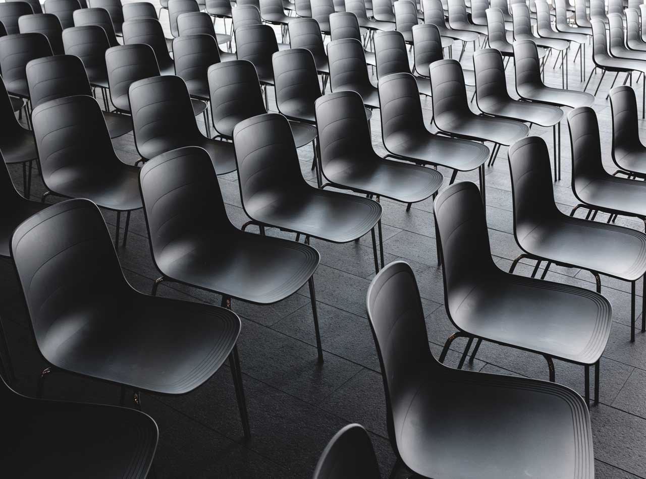Marketing copywriter - Shows a collection of empty chairs