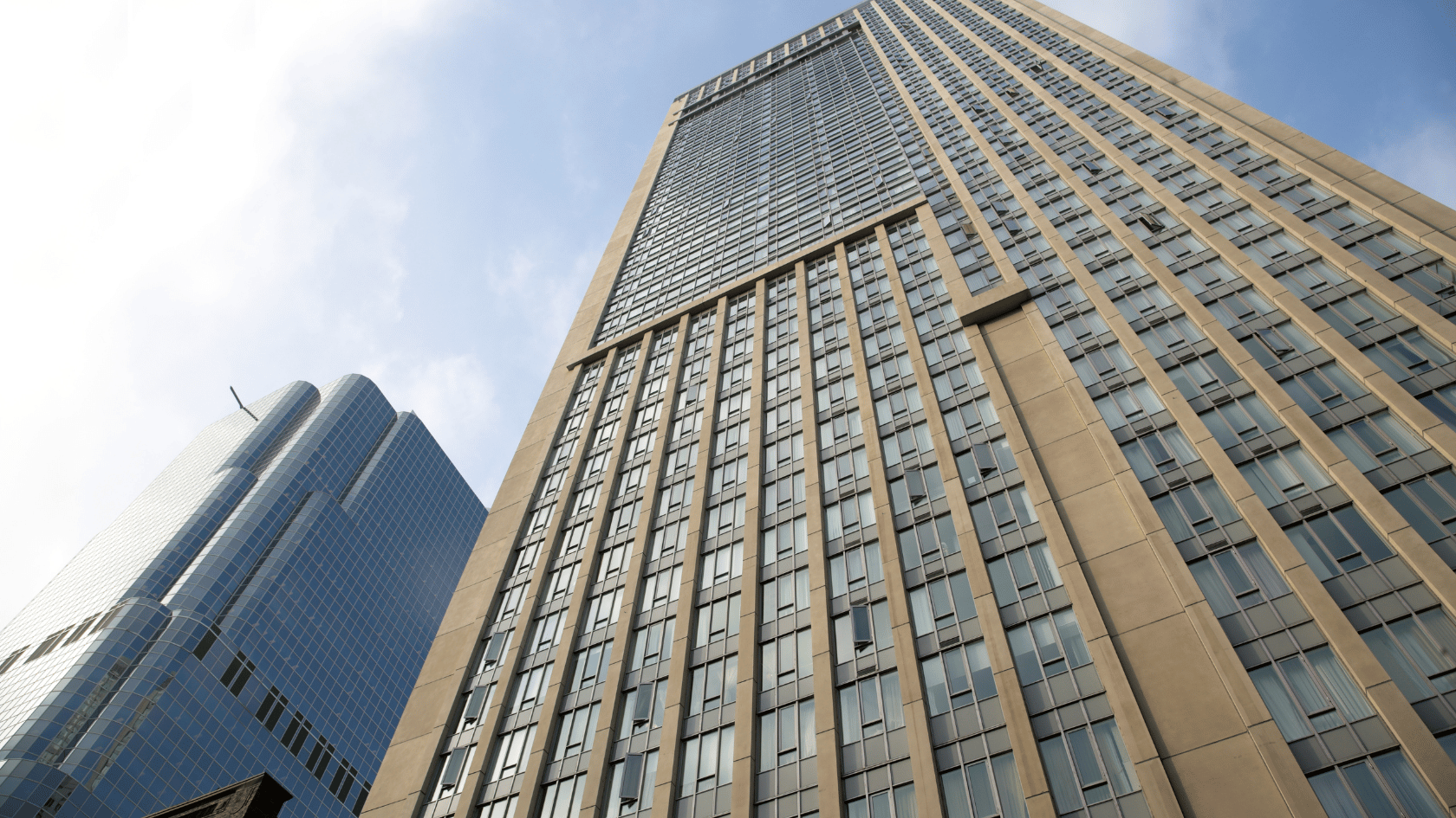 Looking up at a towering building in the city - Types of marketing communication