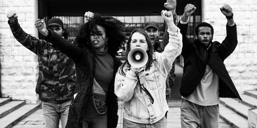 Persuasive copywriting - Shows an image of students raising their hands