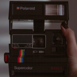 Featured image - Shows a retro Polaroid camera