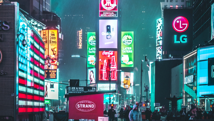 shows an image of a city at night time - content marketing guide