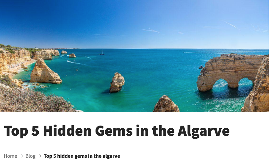 shows an image of a beach in the Algarve Portugal