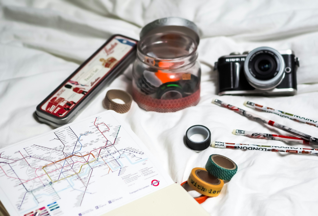 shows objects on a white duvet - how to write a travel blog post