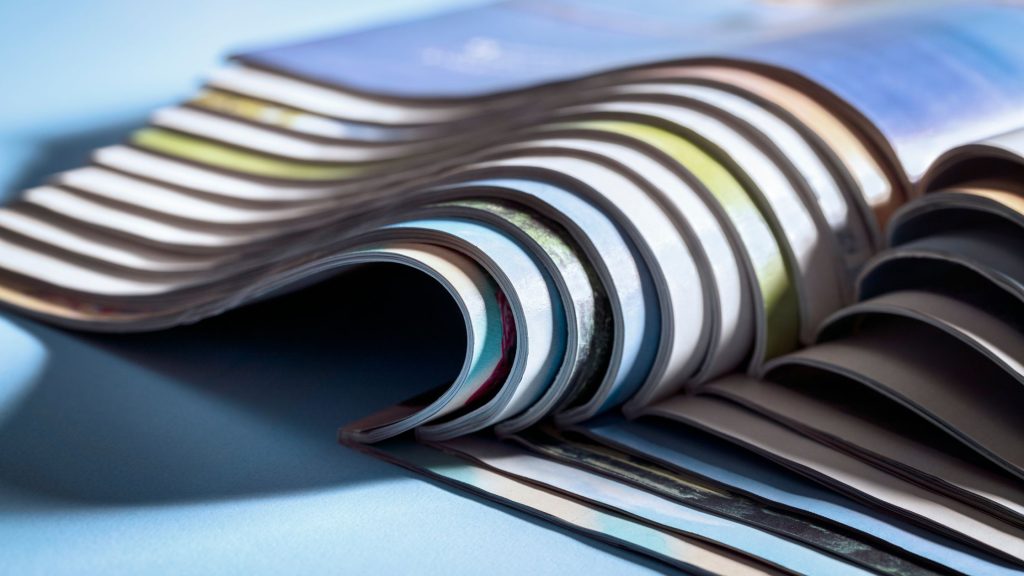 Shows sheets of materials stacked on top of eachother - A 2025 Digital Marketing Audit Guide