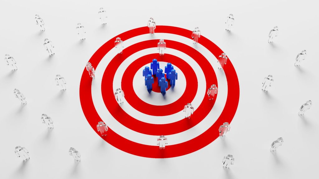 Shows an illustration of blue cartoon people inside a darts board - Consumer Electronics Marketing Guide