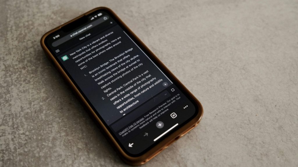 Shows a chat gpt page on a mobile phone - ChatGPT Ads
