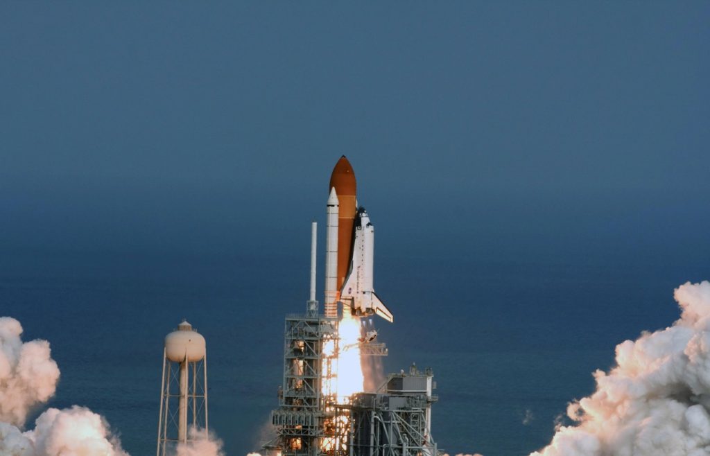 Shows a US Space Shuttle launch at Cape Canaveral, Florida - AI content performance